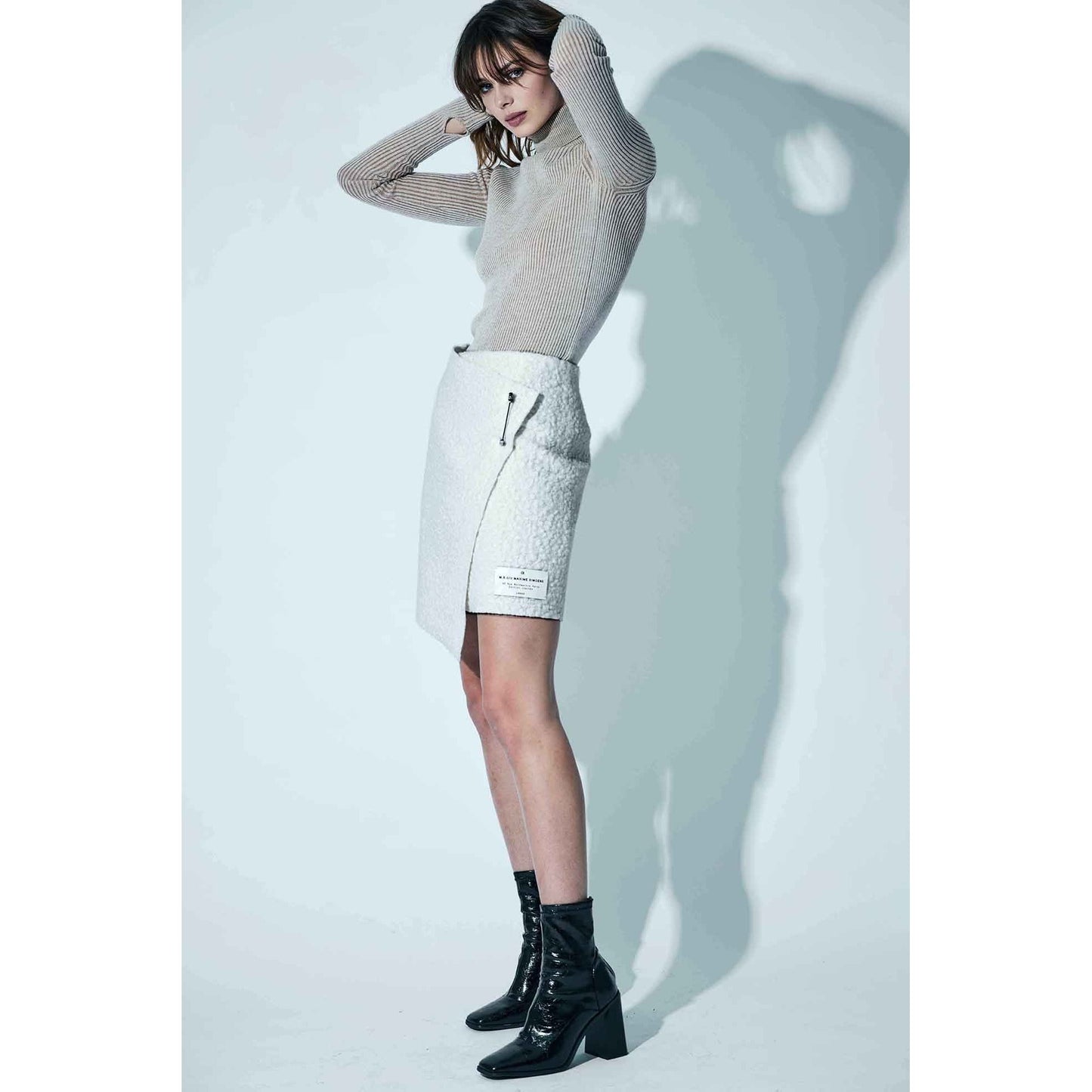 
                  
                    Mini jupe Skirt portefeuille en bouclette de Maxime Simoens Paris - Marquise de Laborde Paris
                  
                