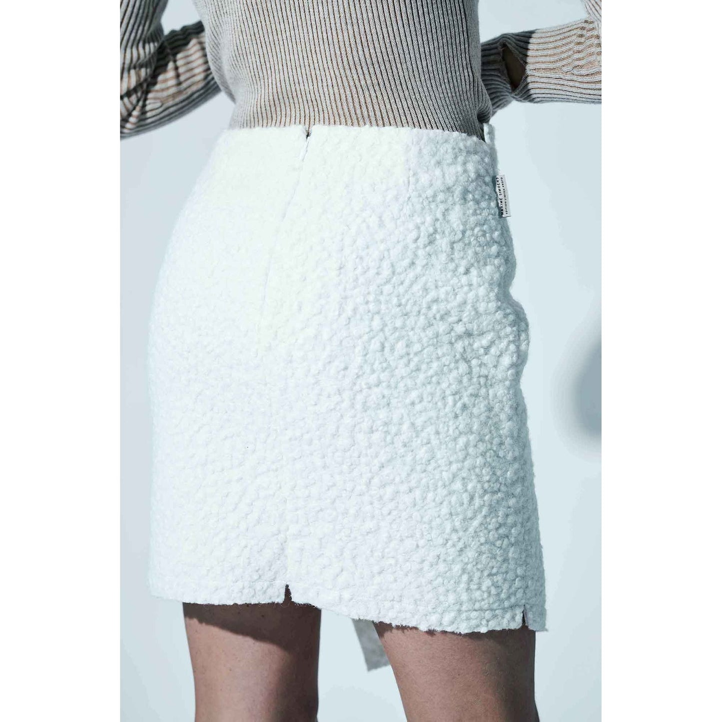 
                  
                    Mini jupe Skirt portefeuille en bouclette de Maxime Simoens Paris - Marquise de Laborde Paris
                  
                